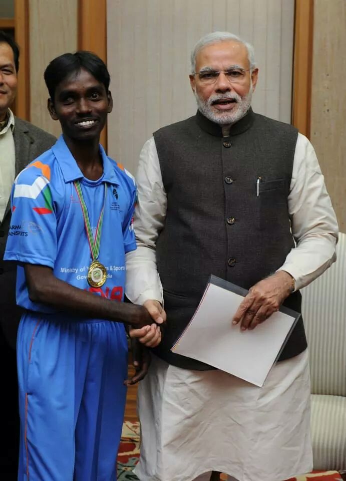 Athlete with gold medal earned through tactile sports training